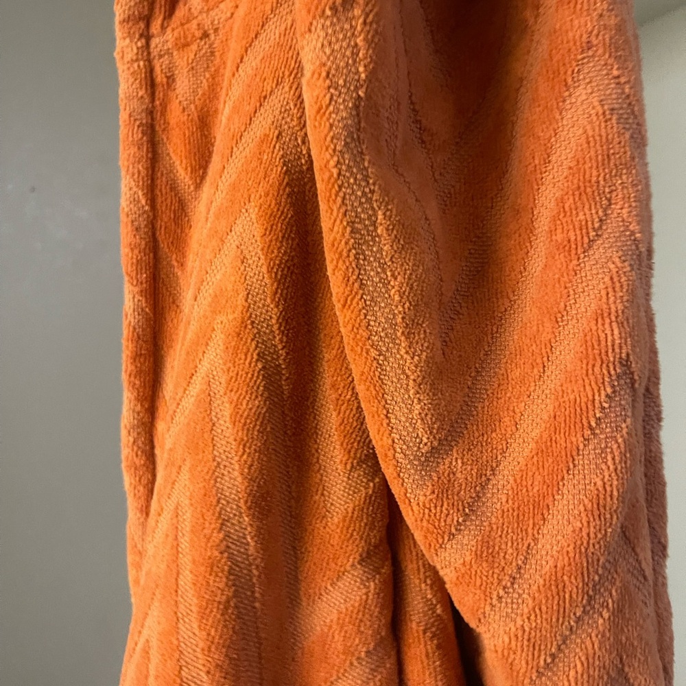 Missoni orange bathrobe, used once, my workouts made my body too big for it.